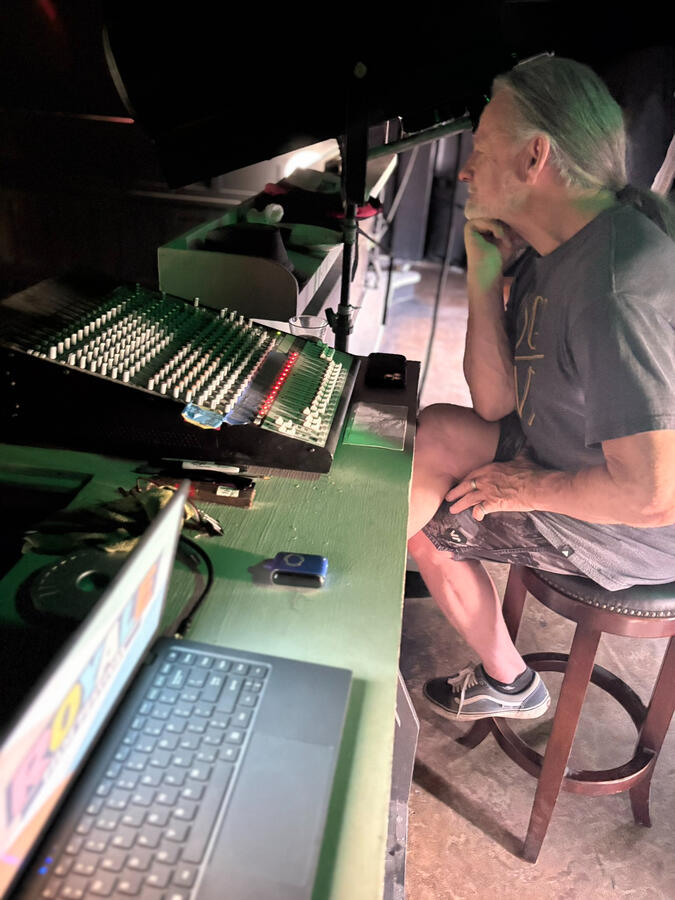 Festival owner Michael Stefaun at the sound board at the 3rd annual Royale Film Festival. (Photo by Yvette Ponte.)