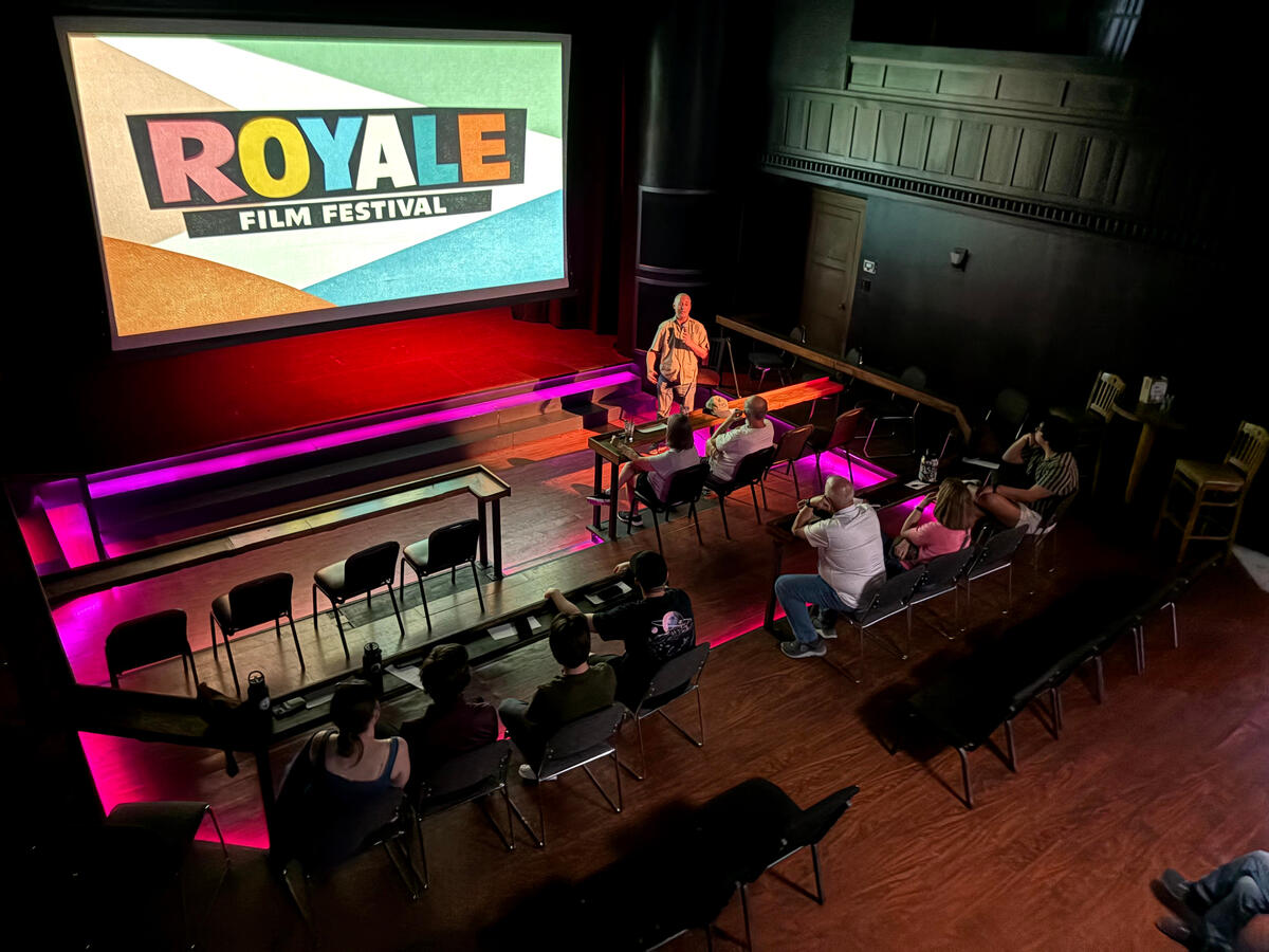 Festival host Danny Hercules introduces a program of shorts at the 3rd annual Royale Film Festival. (Photo by Yvette Ponte.)