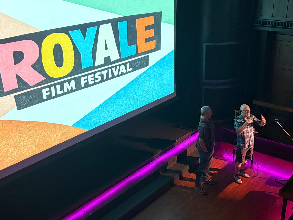 Arizona filmmaker Keenan Murray answers audience Q&A and introduces his award-winning sports documentary Safe Spaces at the 3rd annual Royale Film Festival. (Photo by Yvette Ponte.)